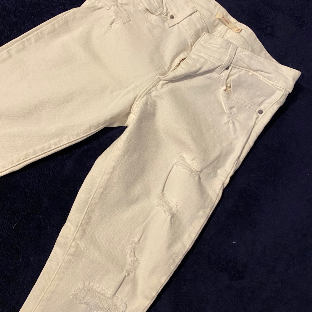 Levi’s | white ripped skinny jeans size 28